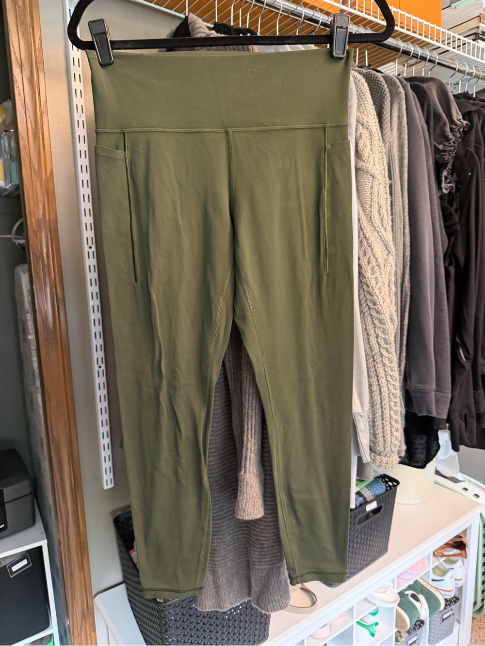 Athleta Olive High-Rise Capri Leggings with Side Pockets. Transcend Stash